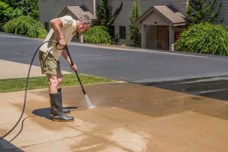 Powerwashing on a residential driveway